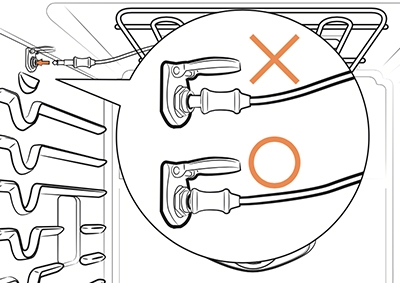 Illustration demonstrating that temperature probe must be fully inserted into its socket