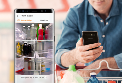 Someone using View Inside to see inside Family Hub from their phone
