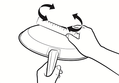 Illustration of a skillet held upside down with a ruler held against the base and being rotated to confirm the base is flat