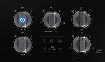 The control knobs with a wait icon imposed on the top left knob
