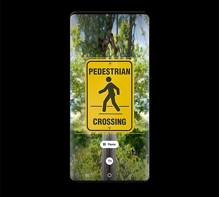 Bixby Vision is reading pedestrian signs and text. Bixby Vision is reading pedestrian signs and text.