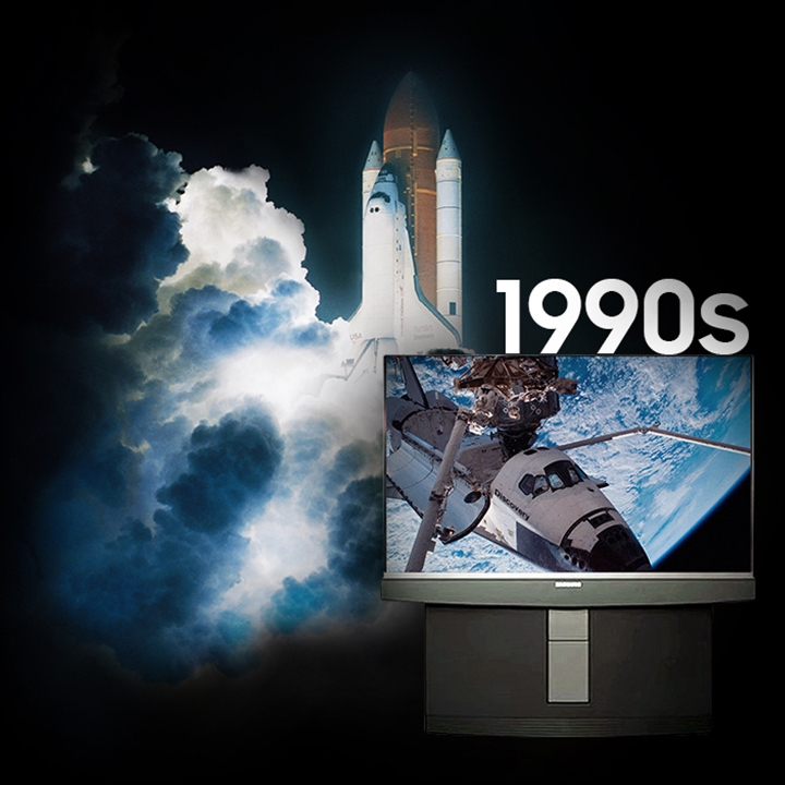 background image of a space shuttle lifting off. On the screen of a 1990’s era television is an image of the shuttle Discovery with its hatch open.