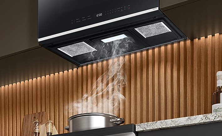 Pot boiling with steam going into Samsung Over the Range vent Pot boiling with steam going into Samsung Over the Range vent