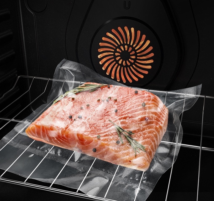 Gourmet cooking results at home Salmon Filet in Vacuum Sealed Sous Vide Bag in an Active Convection Oven
