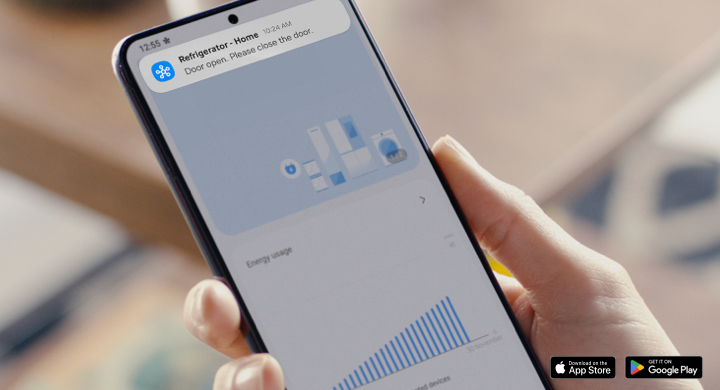 Smartphone showing notification and energy monitoring in SmartThings app Smartphone showing notification and energy monitoring in SmartThings app
