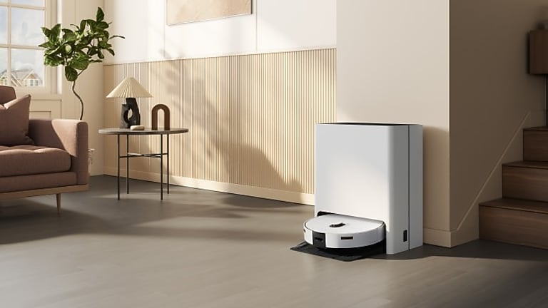 The next standard in cleaning White Jet Bot Robot Vacuum & Mop Combo docked in the all in one cleaning station
