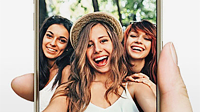 Friends taking selfie