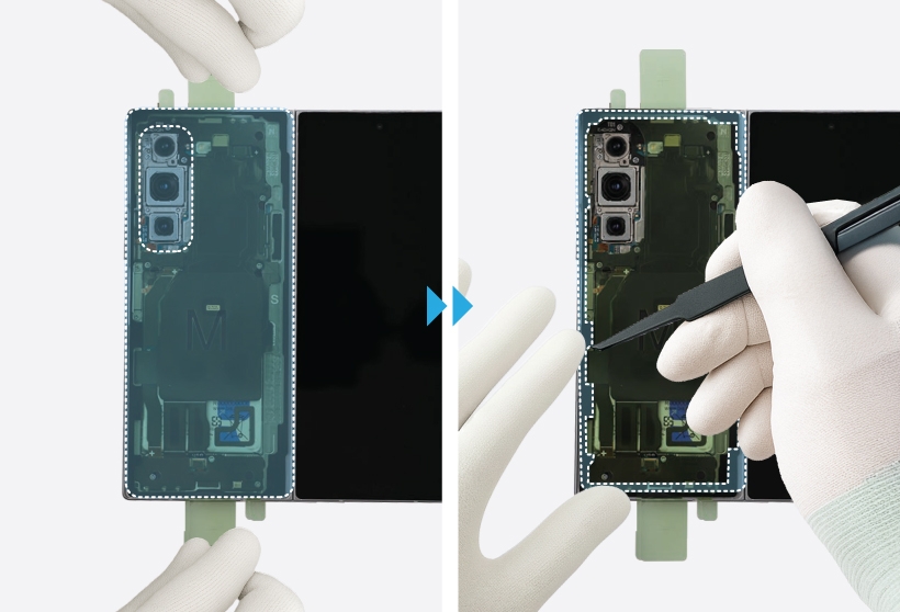 Gloved hands installing the new back cover adhesive tape for the Galaxy Z Fold6.
