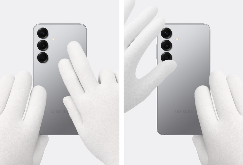 Gloved hands pressing down the deges of the back cover of the Galaxy S25.