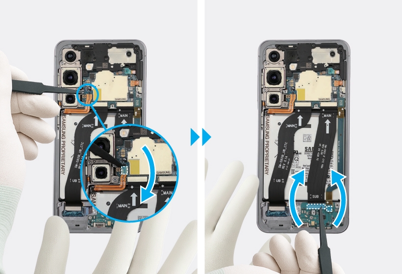 Gloved hands disconnecting the charging port flex connector from the Galaxy S25 main board.
