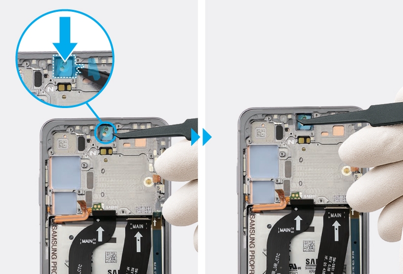 Gloved hand using tweezers placing a new piece of front camera side adhesive tape on the front camera hole and pressing it down.