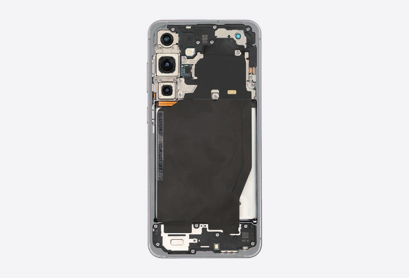 Internal view of Galaxy S25 Plus with the rear cameras and wireless charging module reassembled.