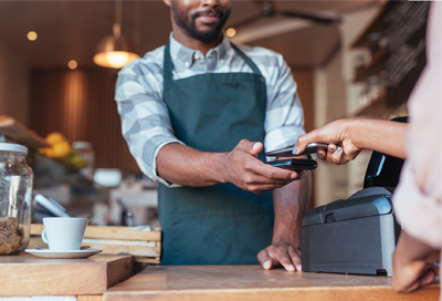 Person making a mobile payment using Samsung Pay Person making a mobile payment using Samsung Pay