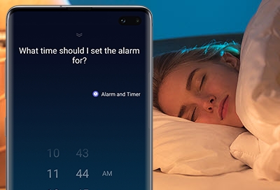 Woman sleeping next to phone with Bixby alarm Woman sleeping next to phone with Bixby alarm