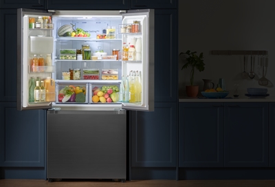 An open refrigerator with interior lights on the in middle of a power outage or blackout