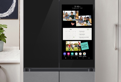 A Family Hub fridge with the different widgets displayed