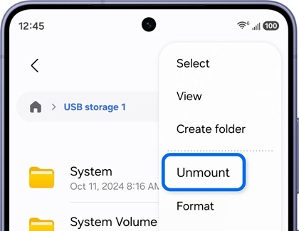 A Galaxy S26 Ultra showing the USB storage menu with the Unmount option highlighted in blue.