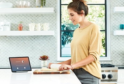 Girl taking phone call on Galaxy tablet Girl taking phone call on Galaxy tablet