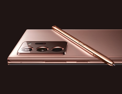 A bronze S Pen sitting on a Note20 A bronze S Pen sitting on a Note20