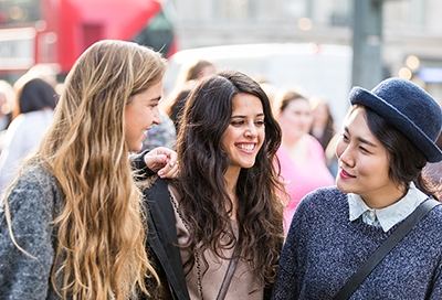 Bilingual students outside in a crowd Bilingual students outside in a crowd