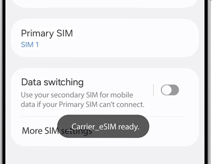 Galaxy phone showing the SIM settings screen with a notification that a carrier eSIM is ready.