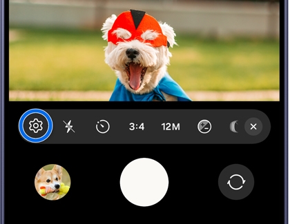 A Galaxy S26 Ultra screen showing the camera toolbar with a gear settings icon circled in blue.