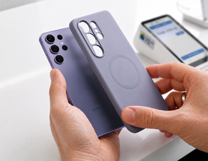 A protective case being removed from the back of a smartphone.