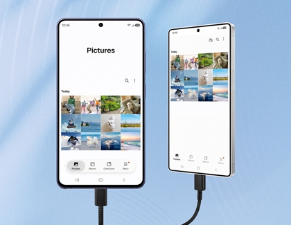 Two Galaxy S26 Ultra connected by a black USB cable while both showing a photo gallery screen.