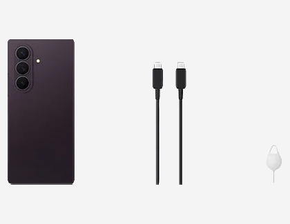 A dark purple Galaxy Z Fold8, a USB-C cable, and a SIM ejector tool spread out on a plain background.