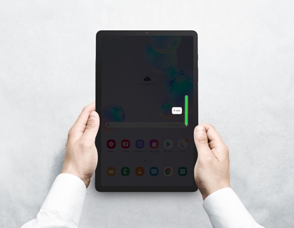 Guy checking the S Pen battery status on Galaxy Tab S6 Guy checking the S Pen battery status on Galaxy Tab S6