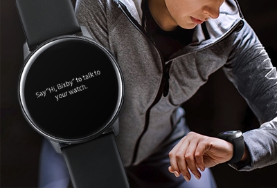 Man using Bixby on his Galaxy Watch Man using Bixby on his Galaxy Watch