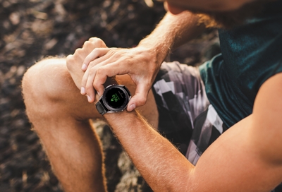 Guy with a Galaxy Watch3 wellness and fitness tracker on her wrist Guy with a Galaxy Watch3 wellness and fitness tracker on her wrist