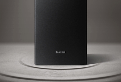 A Samsung subwoofer sitting on the floor