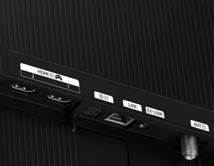Close-up of a Samsung TVs back panel with a sleek and modern black design showing HDMI ports, a LAN port, EX-LINK, and ANT connection.