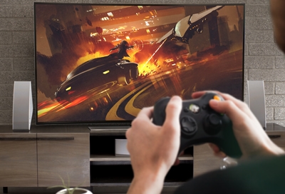 Person gaming on Samsung TV using FreeSync