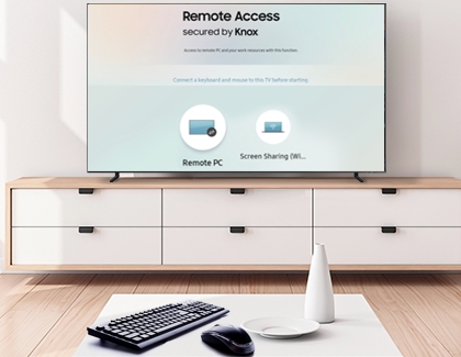 Mouse and keyboard in front of QLED tv on remote access screen with remote PC selected Mouse and keyboard in front of QLED tv on remote access screen with remote PC selected