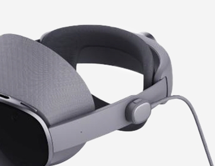Galaxy XR headset with power cord connected to the side.