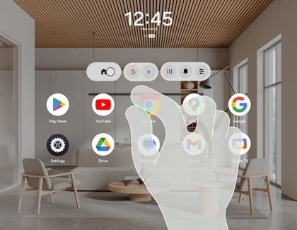 Hand gesture selecting an app icon on the Galaxy XR home screen.