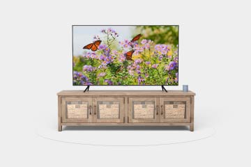 Crystal UHD 4K TV on a stand in a 360 degree, virtual environment