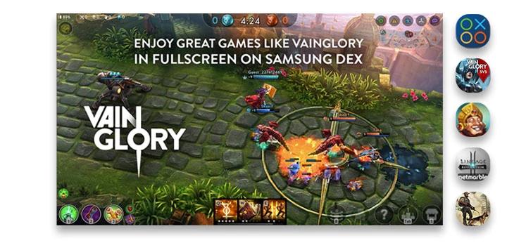 A screen showing a Vainglory game battle in full screen. Five icons show fun apps you can use in DeX mode: Game Launcher, Vainglory, The Tribez, Lineage 2: Revolution, and Last Day on Earth: Survival.