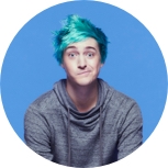 Headshot of the gamer Ninja against a blue background holding a prism black Samsung Galaxy S10+