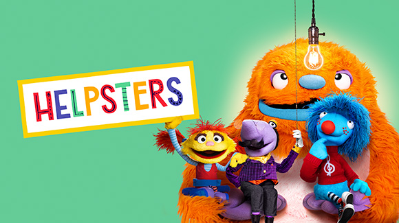 A promo shot for  the new Apple TV+ original show, Helpsters. The image features three cute little monsters sitting on a larger monster. There is a light bulb above their heads and a sign that says "Helpsters" that one of them is holding up.