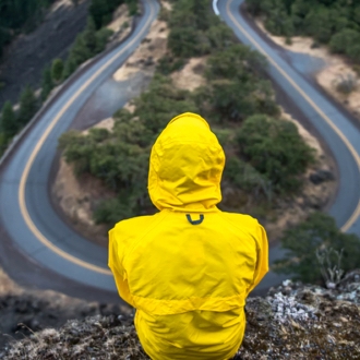 Person looking to change directions with his phone usage