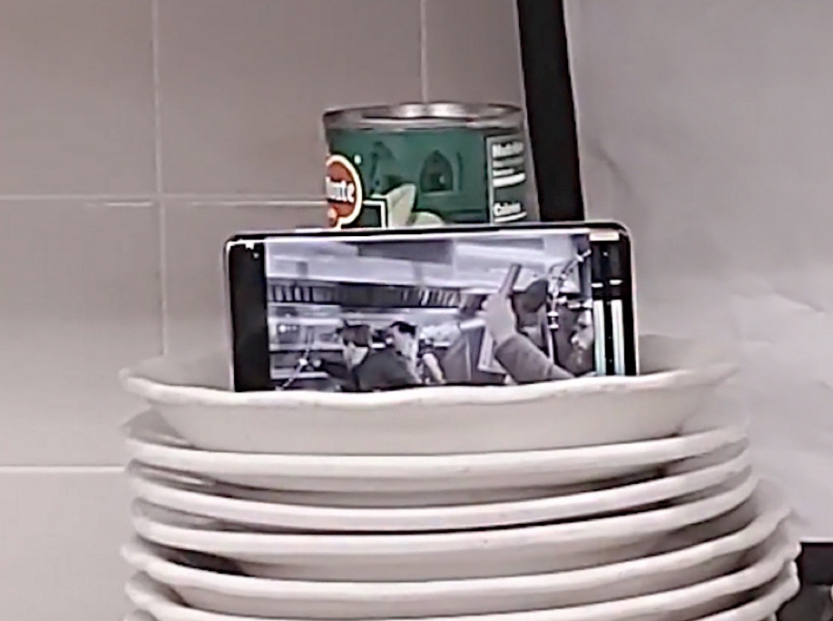 Samsung Galaxy S10+ records the kitchen staff at work at Rao's italian restaurant in New York City