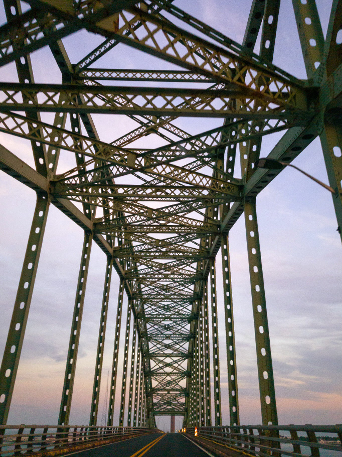 Photo taken from the middle of a bridge.