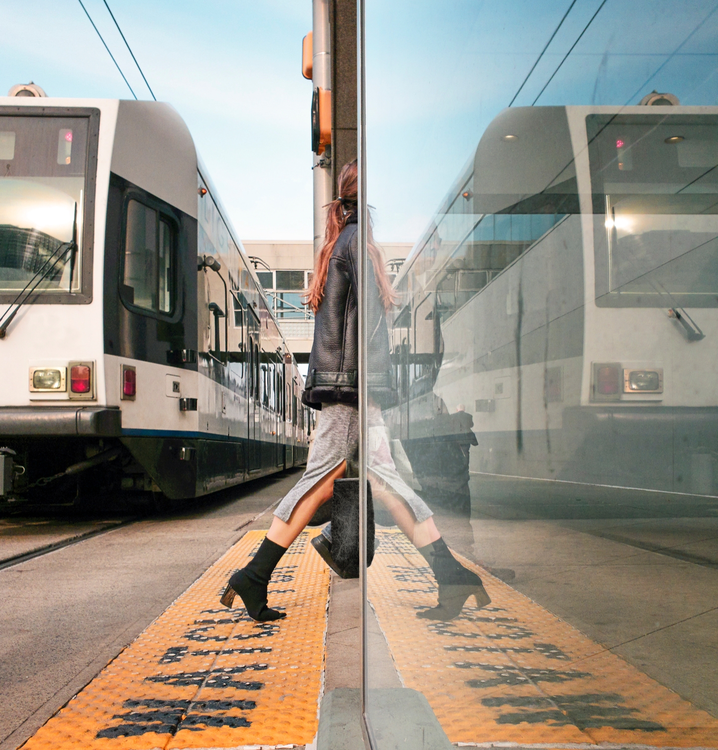 Side-view of a woman stepping onto a train captured #withGalaxy