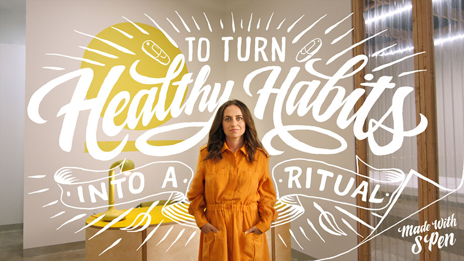 The Founder and CEO of Ritual, Katerina Schneider standing with her hands in her pockets while facing the camera. There is handwriitten script overlayed on top of the photo and all around her which reads: "To turn healthy habits into a ritual. Made with S Pen".