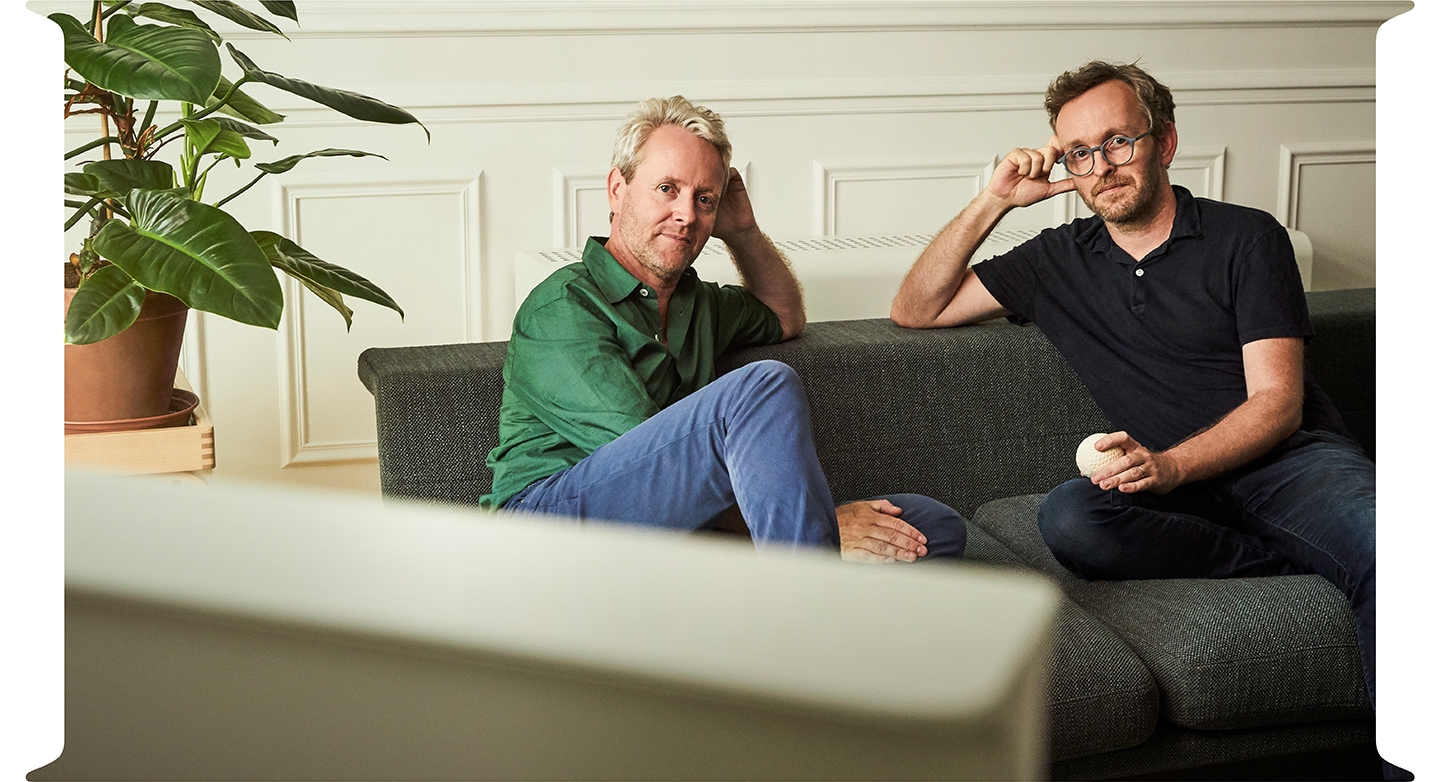 The Serif designers, Ronan and Erwan Bouroullec, watch 2019 The Serif in a modern style living room.