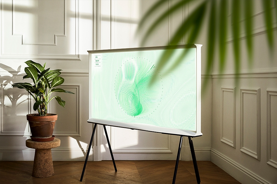 The Serif, Samsung TV with legs, is placed in Vitra Showroom with Ambient Mode, illustrating tv interior design and tv stand ideas.