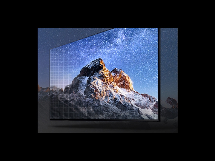 image of a mountaintop. The image bleeds outside of a QLED 8K screen demonstrating how realistic the images are on this top of the line screen.